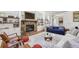 Inviting living room featuring a fireplace, built-in shelves, and comfortable seating at 1363 Sylvan Ne Cir, Brookhaven, GA 30319