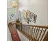 Elegant staircase with patterned carpet runner and natural wood railing at 1363 Sylvan Ne Cir, Brookhaven, GA 30319