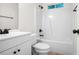 Bright, updated bathroom with a tub/shower combination and modern fixtures at 4292 Hurt Bridge Rd, Cumming, GA 30028