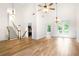 Open-concept living area with high ceilings, hardwood floors, and natural light at 4292 Hurt Bridge Rd, Cumming, GA 30028