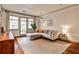 Cozy living room featuring hardwood floors and a connection to the outdoors at 55 Delmont Ne Dr # C3, Atlanta, GA 30305