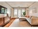 Well-lit living room with large windows, hardwood floors, and stylish decor at 55 Delmont Ne Dr # C3, Atlanta, GA 30305