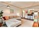 Bright living room featuring hardwood floors and an open layout to the kitchen at 55 Delmont Ne Dr # C3, Atlanta, GA 30305