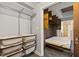 Modern bedroom featuring a Murphy bed and closet storage space at 30 5Th Ne St # 1010, Atlanta, GA 30308