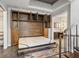 Compact bedroom equipped with a full Murphy bed and storage, with an ensuite bathroom at 30 5Th Ne St # 1010, Atlanta, GA 30308