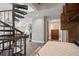 Bedroom showing a murphy bed and stairway access to the living area at 30 5Th Ne St # 1010, Atlanta, GA 30308