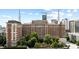 Exterior of the Biltmore House, showcasing its grand facade and architectural style, against a cityscape backdrop at 30 5Th Ne St # 1010, Atlanta, GA 30308