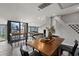Modern dining area with an open floor plan and expansive city views at 30 5Th Ne St # 1010, Atlanta, GA 30308