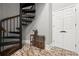 View of the foyer featuring a spiral staircase, double doors, and brick floor at 30 5Th Ne St # 1010, Atlanta, GA 30308