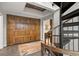 Hallway featuring a custom wooden wall design and open staircase at 30 5Th Ne St # 1010, Atlanta, GA 30308