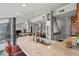 Contemporary kitchen with granite countertops, stainless steel sink and adjacent breakfast bar at 30 5Th Ne St # 1010, Atlanta, GA 30308