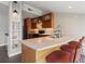 Stylish kitchen with granite counters, breakfast bar, and stainless sink at 30 5Th Ne St # 1010, Atlanta, GA 30308