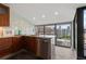 Modern kitchen features stainless appliances and bright city views at 30 5Th Ne St # 1010, Atlanta, GA 30308