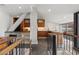 Modern kitchen and dining area with wooden cabinets, granite countertops and city view at 30 5Th Ne St # 1010, Atlanta, GA 30308