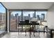 This workspace features a large window showing a stunning skyline view of the city at 30 5Th Ne St # 1010, Atlanta, GA 30308