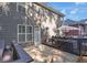 Cozy backyard featuring a deck with an umbrella and outdoor seating area at 3123 Wolf Club Dr. Sw, Atlanta, GA 30349