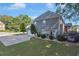 Spacious backyard showcasing lush lawn and a deck, great for outdoor entertainment and relaxing at 3123 Wolf Club Dr. Sw, Atlanta, GA 30349