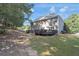 Expansive backyard featuring multiple decks, perfect for entertaining guests outdoors at 3123 Wolf Club Dr. Sw, Atlanta, GA 30349