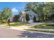 Charming two-story home with a well-manicured lawn and long driveway at 3123 Wolf Club Dr. Sw, Atlanta, GA 30349