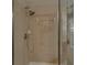 Enclosed shower with adjustable head and tile surround, perfect for a relaxing and spa-like experience at 3123 Wolf Club Dr. Sw, Atlanta, GA 30349