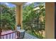 Balcony with seating, green views, and black wrought iron railing at 3777 Peachtree Ne Rd # 1216, Atlanta, GA 30319