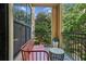 Outdoor balcony featuring seating and views of lush greenery at 3777 Peachtree Ne Rd # 1216, Atlanta, GA 30319