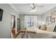 Main bedroom with hardwood floors, decor, and a bright window at 3777 Peachtree Ne Rd # 1216, Atlanta, GA 30319