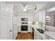 Bright kitchen with white cabinets, modern appliances, and stylish backsplash at 3777 Peachtree Ne Rd # 1216, Atlanta, GA 30319