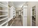 Spacious walk-in closet with custom shelving and storage solutions at 3777 Peachtree Ne Rd # 1216, Atlanta, GA 30319