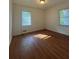 Inviting bedroom with wood floors, bright natural light, and a soothing atmosphere at 2014 Brannen Se Rd, Atlanta, GA 30316