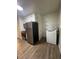 A bright kitchen featuring stainless steel appliances, ample storage, and convenient in-unit laundry hookups at 2014 Brannen Se Rd, Atlanta, GA 30316