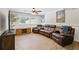 Basement media room with a large leather sectional couch at 231 Cross Gate Dr, Marietta, GA 30068