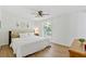 Comfortable bedroom featuring wood floors, large window, and neutral decor at 231 Cross Gate Dr, Marietta, GA 30068