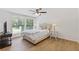 Bright bedroom featuring wood floors and a large window at 231 Cross Gate Dr, Marietta, GA 30068