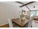 Dining area with hardwood floors, chandelier, and large table perfect for Gathering meals at 231 Cross Gate Dr, Marietta, GA 30068