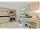 Well-lit kitchen featuring modern appliances, granite countertops, and lots of natural light at 231 Cross Gate Dr, Marietta, GA 30068
