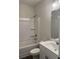 Cozy bathroom with a shower-tub, and sleek vanity and countertop at 3536 Dogwood Pass, Lithonia, GA 30038