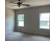 Spacious bedroom with carpet and two windows at 3536 Dogwood Pass, Lithonia, GA 30038