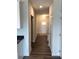 Entrance foyer with adjacent kitchen and open hallway at 3536 Dogwood Pass, Lithonia, GA 30038