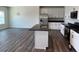 Open concept kitchen with island that overlooks the great room at 3536 Dogwood Pass, Lithonia, GA 30038