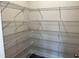 Walk-in closet features built-in wire shelving at 3536 Dogwood Pass, Lithonia, GA 30038