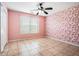 Bedroom featuring tiled flooring, a ceiling fan, and a large window at 55 Ashland Farm Rd, Oxford, GA 30054
