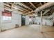 Spacious unfinished basement with exposed ceiling and concrete flooring at 5709 Center Hill Church Rd, Loganville, GA 30052