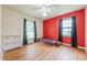 Bedroom featuring hardwood floors, a daybed, and natural lighting at 5709 Center Hill Church Rd, Loganville, GA 30052