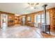 Spacious living space showcasing wood burning stove, access to kitchen and outdoor at 5709 Center Hill Church Rd, Loganville, GA 30052