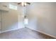 Bright bedroom with neutral carpet, fan, and a closet, offering ample storage space at 2010 2Nd Ave, Decatur, GA 30032