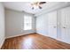 Bright bedroom features hardwood floors, a ceiling fan, and neutral paint for a clean, modern look at 2010 2Nd Ave, Decatur, GA 30032