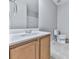 Bathroom featuring a white sink, wood vanity and tile flooring at 232 Oconee Way, Canton, GA 30114
