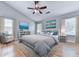 Spacious main bedroom with vaulted ceilings, hardwood flooring, and ample natural light at 232 Oconee Way, Canton, GA 30114
