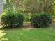 An inviting garden entrance in a lush backyard with mature landscaping at 5020 Bayberry Dr, Cumming, GA 30040
